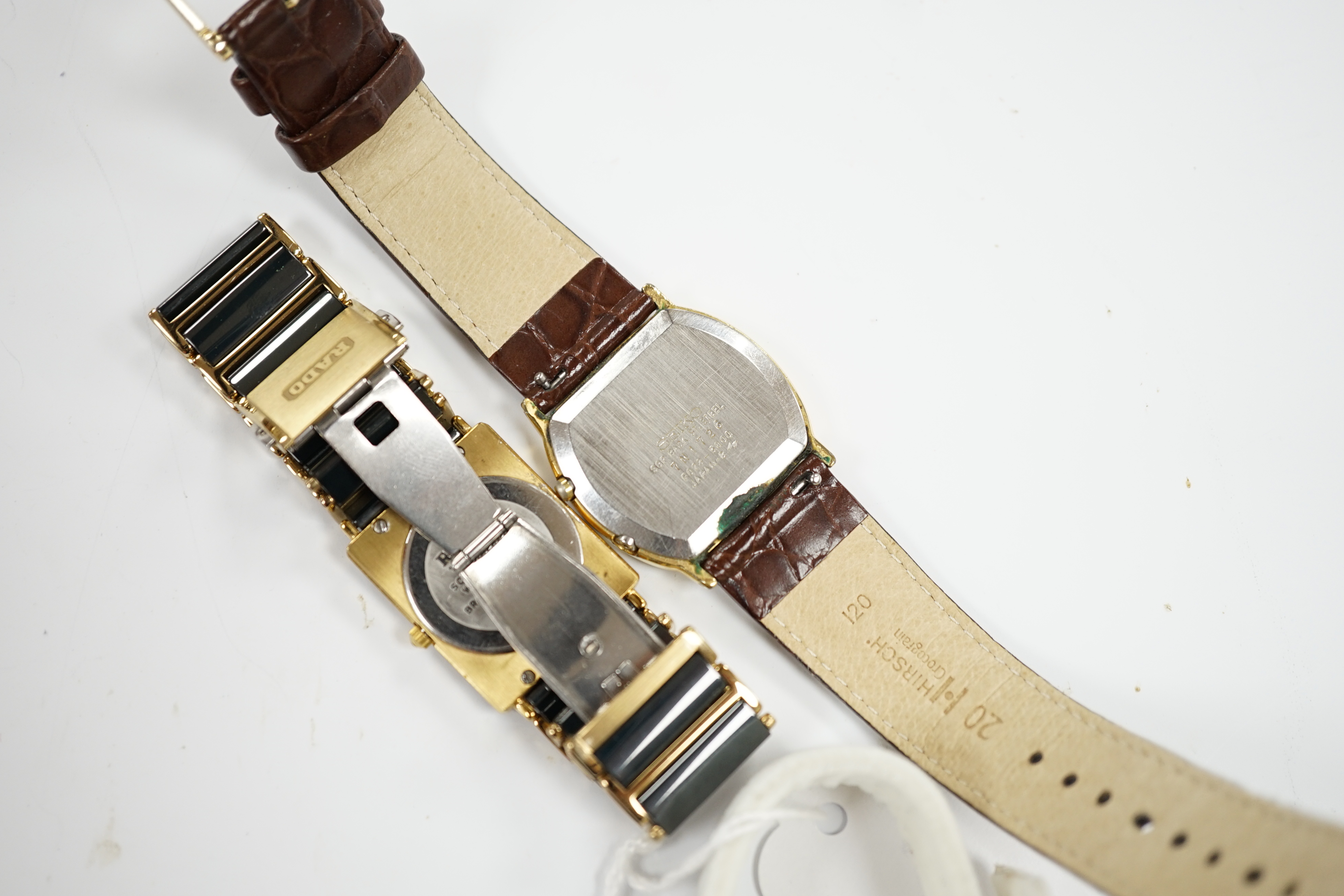A gentleman's ceramic and gilt steel Rado Diastar wrist watch and a Seiko wrist watch.